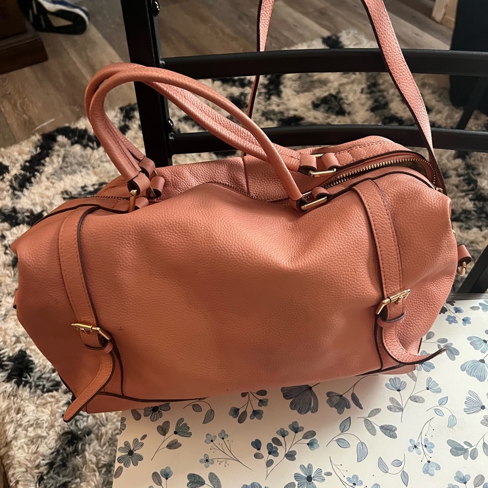 In perfect condition. Genuine leather.